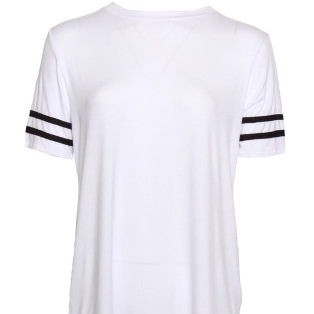 White t-shirt with black stripes on sleeve